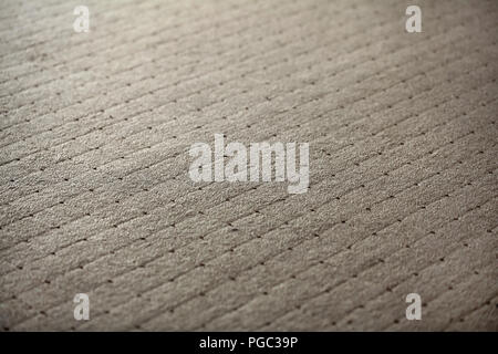 Abstract background - shallow depth of field photo - carpet with square texture. Stock Photo