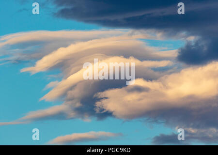 Silky clouds at sunset Stock Photo