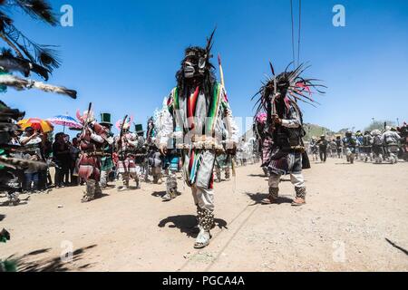 The Pharisees of the Yaqui tribe perform a mask burning ritual during Holy Week in Hermosillo, Sonora Mexico. They use strange characters of animals, Stock Photo