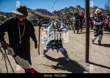 The Pharisees of the Yaqui tribe perform a mask burning ritual during Holy Week in Hermosillo, Sonora Mexico. They use strange characters of animals, Stock Photo