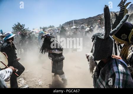 The Pharisees of the Yaqui tribe perform a mask burning ritual during Holy Week in Hermosillo, Sonora Mexico. They use strange characters of animals, Stock Photo