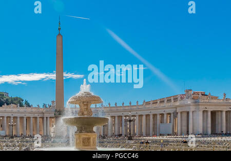 Vatican city, Vatican - October 12, 2016: Bernini's colonnades, Maderno's fountain and Egyptian obelisk on Saint Peter's (San Pietro) Square in Vatica Stock Photo