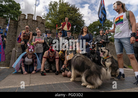 Cardiff, Wales, August 25, 2018: Spectators and march participants pose for photos at the  Annual Pride Cymru Parade  in Cardiff, Wales on August 25, 2018 ©Daniel Damaschin Credit: Daniel Damaschin/Alamy Live News Stock Photo