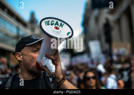 London, London, UK. 25th Aug, 2018. Vegan seen written on a megaphone during the march.The Official Animal Rights March is an annual vegan march founded by UK animal rights organization Surge. The march goes through the streets of London, demanding an end to all animal oppression. Credit: Brais G. Rouco/SOPA Images/ZUMA Wire/Alamy Live News Stock Photo