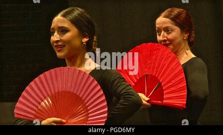 Albuquerque, USA. 25th Aug, 2018. Yjastro dancers perform flamenco in old town Albuquerque, New Mexico, the United States, on Aug. 20, 2018. Flamenco, the traditional folk music in southern Spain, enjoys exceptionally wide popularity in the Southwest of the United States. Yjastros, the American Flamenco Repertory Company, has a revolutionary approach that combines the structured improvisation of traditional Spanish flamenco with modern American repertory dance. Credit: Richard Lakin/Xinhua/Alamy Live News Stock Photo