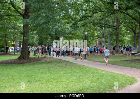 North Carolina, USA. 25 August 2018. Demonstration  at Silent Sam Statue, UNC Campus with police monitoring Credit: DavidEco/Alamy Live News Stock Photo