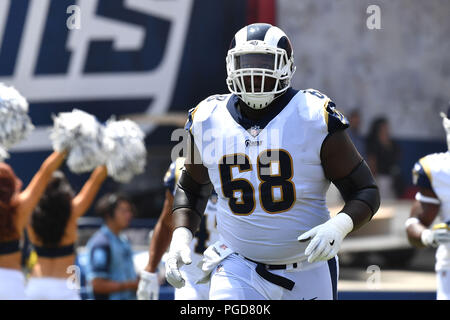 Los Angeles Rams offensive guard Austin Blythe talks with his son prior to  an NFL football game against the Chicago Bears Sunday, Nov. 17, 2019, in  Los Angeles. (AP Photo/Mark J. Terrill