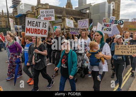 London, UK. 25th August 2018. Thousands or vegans march through London from Westminster to Hyde Park on the Official Animal Rights March founded by animal rights organisation Surge, calling for an end to animal oppression and urging everyone to stop eating animals and using dairy products. They say that animal lives matter as much as ours and call for an end to speciesism, and the misuse of animals for food, clothing and sport. Peter Marshall/Alamy Live News Stock Photo