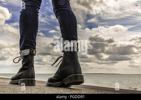 doc marten boots at southend on sea beach Stock Photo
