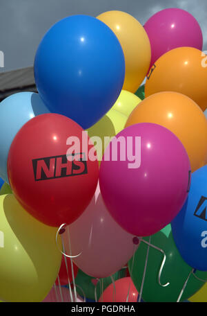 Balloons carried by participants in the NHS entry in Manchester LGBT Pride Parade 2018 Stock Photo