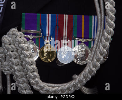 Medals on police officer's uniform at Manchester LGBT Pride Parade 2018 Stock Photo