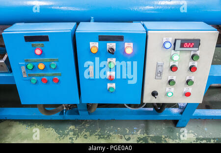 Electrical control panel with the switch button in the water filtration plant. Stock Photo