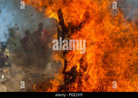 The Pharisees of the Yaqui tribe perform a mask burning ritual during Holy Week in Hermosillo, Sonora Mexico. They use strange characters of animals, Stock Photo