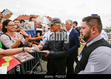 Worms, Germany. 24th Aug, 2018. Terence Hill sign s his autograph for his fans. Italian actor Terence Hill visited the German city of Worms, to present his new movie (My Name is somebody). Terence Hill added the stop in Worms to his movie promotion tour in Germany, to visit a pedestrian bridge, that is unofficially named Terence-Hill-Bridge (officially Karl-Kubel-Bridge). Credit: Michael Debets/Pacific Press/Alamy Live News Stock Photo