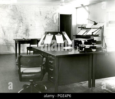 Forecast Desk With World Map on Wall Scottsbluff, NE 1950-1964 Stock Photo