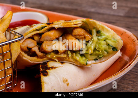 Pork Burrito with French potato Stock Photo