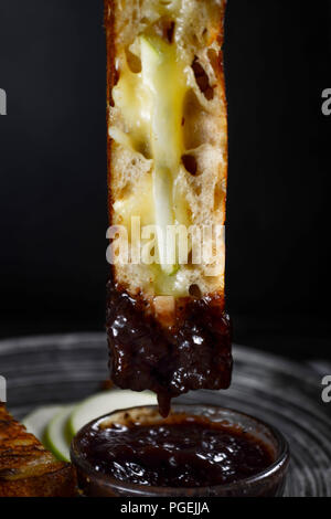 Grilled cheese sandwich being grilled in frying pan Stock Photo - Alamy