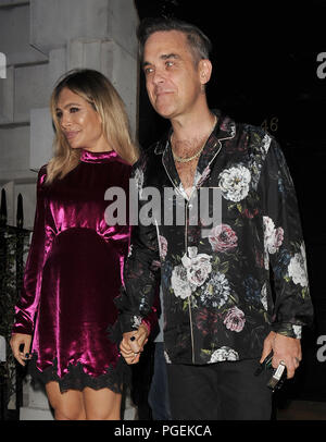 Robbie Williams and wife Ayda Field enjoy a night out at Annabel's private members club in Mayfair. The X Factor judges left just before midnight.  Featuring: Robbie Williams, Ayda Field Where: London, United Kingdom When: 25 Jul 2018 Credit: Will Alexander/WENN.com Stock Photo