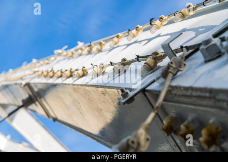 Beam extending into the sky with lights lined on either side. Stock Photo