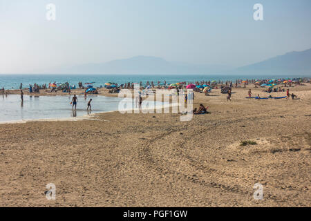 Tarifa Beach, High season with sunbathers at Atlantic ocean, Playa chica at Tarifa,, Andalusia, Spain Stock Photo