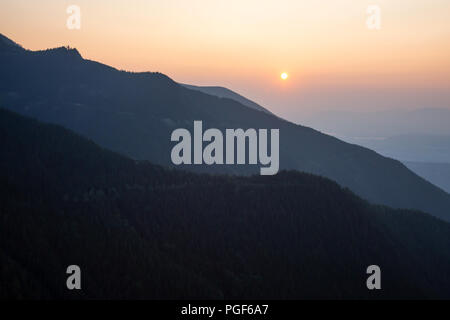 Dreamy aerial landscape during a smoggy sunset. Taken near Chilliwack, East of Vancouver, BC, Canada. Stock Photo