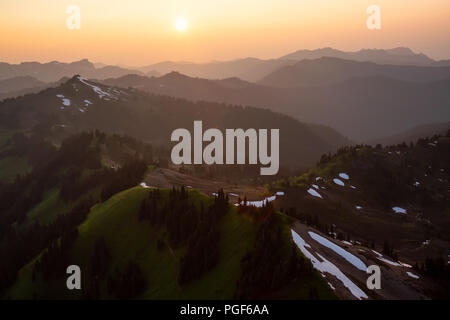 Dreamy aerial landscape during a smoggy sunset. Taken near Chilliwack, East of Vancouver, BC, Canada. Stock Photo