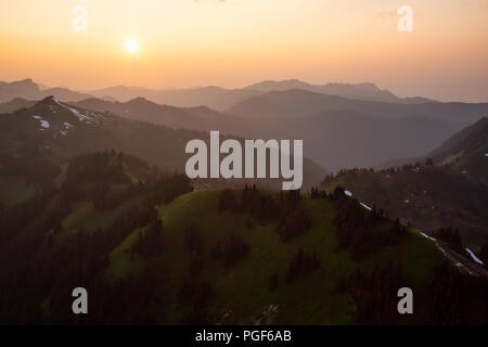 Dreamy aerial landscape during a smoggy sunset. Taken near Chilliwack, East of Vancouver, BC, Canada. Stock Photo