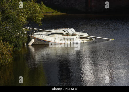 Boats moored in Loch Lomond in Loch Lomond and Trossachs National Park Stock Photo