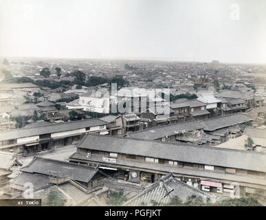 [ c. 1890s Japan - Panoramic View of Tokyo ] —   A spectacular view on the city of Tokyo from Atago-yama, a hill some 26 meters above sea-level. Shops and dwellings have taken the place of the great residences of the daimyo. In the far background, the roof of Tsukiji Honganji can be seen. Beyond that is Tokyo Bay.  19th century vintage albumen photograph. Stock Photo