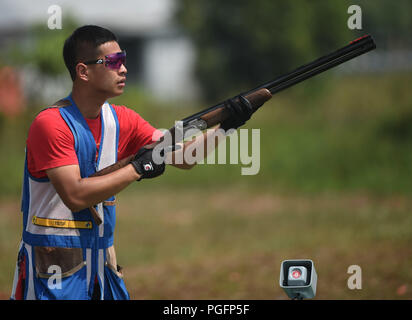 Palembang, Indonesia. 26th Aug, 2018. Yang Jiang of China competes during the men's skeet qualification of shooting at the 18th Asian Games 2018 in Palembang, Indonesia, Aug. 26, 2018. Credit: Wang Shen/Xinhua/Alamy Live News Stock Photo