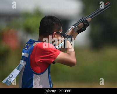 Palembang, Indonesia. 26th Aug, 2018. Yang Jiang of China competes during the men's skeet qualification of shooting at the 18th Asian Games 2018 in Palembang, Indonesia, Aug. 26, 2018. Credit: Wang Shen/Xinhua/Alamy Live News Stock Photo