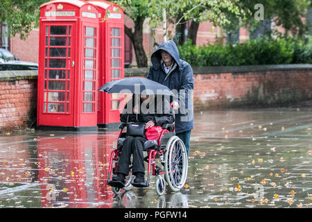 Southport, Merseyside, 26/08/2018. UK Weather. Bank holiday washout with strong winds and heavy rain.  Weather conditons deter holiday makers from visiting the seafront attractions on the north-west coast.   Credit; MediaWorldImages/AlamyLive News Stock Photo
