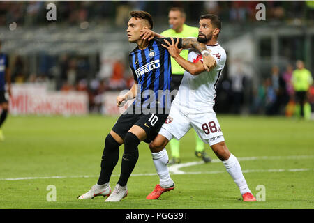 Milano, Italy. 26th August, 2018.  Lautaro Martinez of FC Internazionale and Tomas Rincon of Torino Fc in action during the Serie A match between FC Internazionale and Torino Fc. Stock Photo