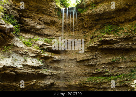 Mysterious Waterfall Deep In The Forest Stock Photo
