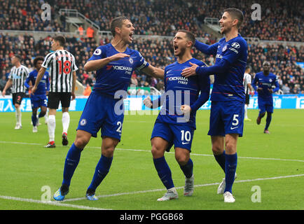 Chelsea's Eden Hazard (centre) celebrates scoring his side's first goal of the game with team-mates Cesar Azpilicueta (left) and Filho Jorge Jorginho during the Premier League match at St James' Park, Newcastle. PRESS ASSOCIATION Photo. Picture date: Sunday August 26, 2018. See PA story SOCCER Newcastle. Photo credit should read: Owen Humphreys/PA Wire. RESTRICTIONS: No use with unauthorised audio, video, data, fixture lists, club/league logos or 'live' services. Online in-match use limited to 120 images, no video emulation. No use in betting, games or single club/league/pla Stock Photo