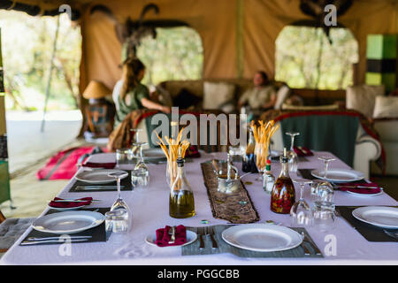 Table setting in a restaurant for romantic lunch or dinner Stock Photo