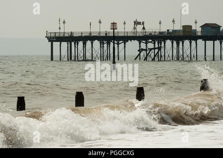 Teignmouth Grand Pier during winter gales storm on the beach, Devon, England, UK. Stock Photo