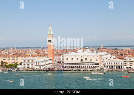 Aerial view Doges Palace and St Marks Campanile, San Marco, Venice, Veneto, Italy with a view over the rooftops of the city and lagoon to the mainland Stock Photo