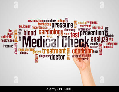 Medical check word cloud and hand with marker concept on gradient  background. Stock Photo