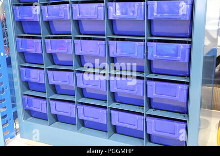 Plastic drawer for keeping parts in factory Stock Photo