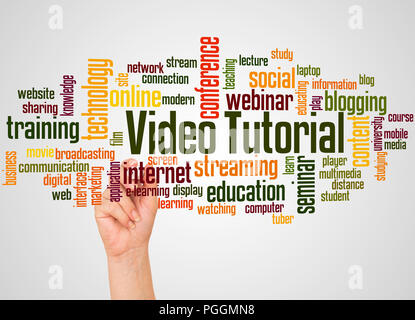 Video tutorial word cloud and hand with marker concept on white background. Stock Photo