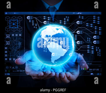 Blockchain technology concept with diagram of chain and encrypted blocks.businessman holding a glowing earth globe in his hands Stock Photo