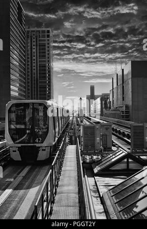 Image of an approaching  Shinkotsu Yurikamome, (automated new transit  train in the Tokyo Bay area of Japan. Stock Photo