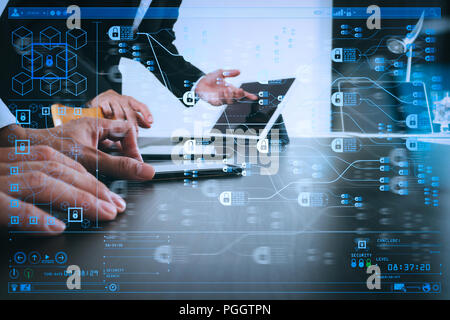 Blockchain technology concept with diagram of chain and encrypted blocks.co working team meeting concept,businessman using smart phone and digital tab Stock Photo