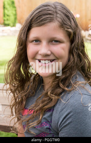 Smiling 10 Year Girl Looking at Camera, USA, Stock Photo