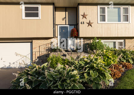 Residential House Exterior in Middle Class Neighborhood, MT, USA Stock Photo