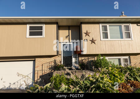 Residential House Exterior in Middle Class Neighborhood, MT, USA Stock Photo