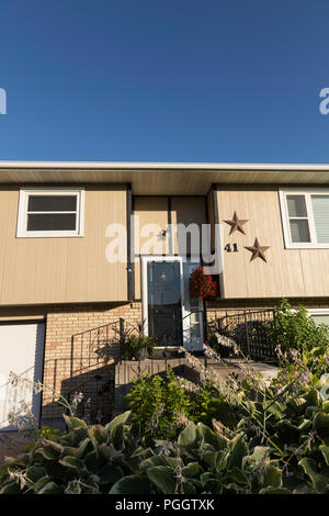 Residential House Exterior in Middle Class Neighborhood, MT, USA Stock Photo