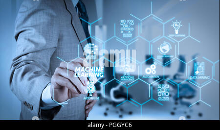 Machine learning technology diagram with artificial intelligence (AI),neural network,automation,data mining in VR screen.businessman hand working with Stock Photo