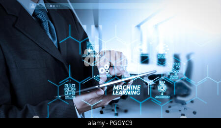 Machine learning technology diagram with artificial intelligence (AI),neural network,automation,data mining in VR screen.Businessman hand working with Stock Photo